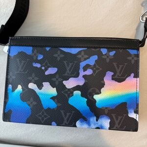 Louis Vuitton Gaston Wearable Wallet (never been used)